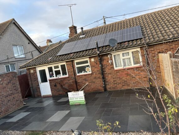 sandstone garden patio with block paved driveway extension in rochford 05