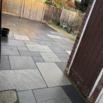 sandstone garden patio with block paved driveway extension in rochford 06
